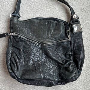 Tylie Malibu Black Soft Pebbled Leather Women's Bag with silver hardware